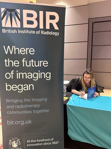 Christina_signing_AI_book