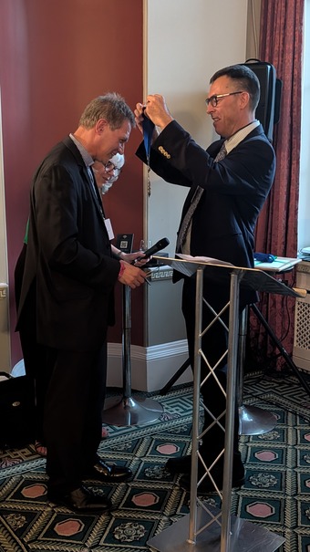 Mike getting medal